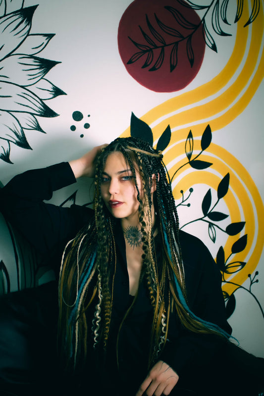 Dreads, tranças, cachos e arte